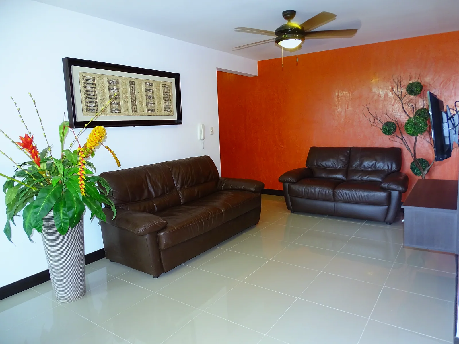 Living room with sofa and flat-screen TV